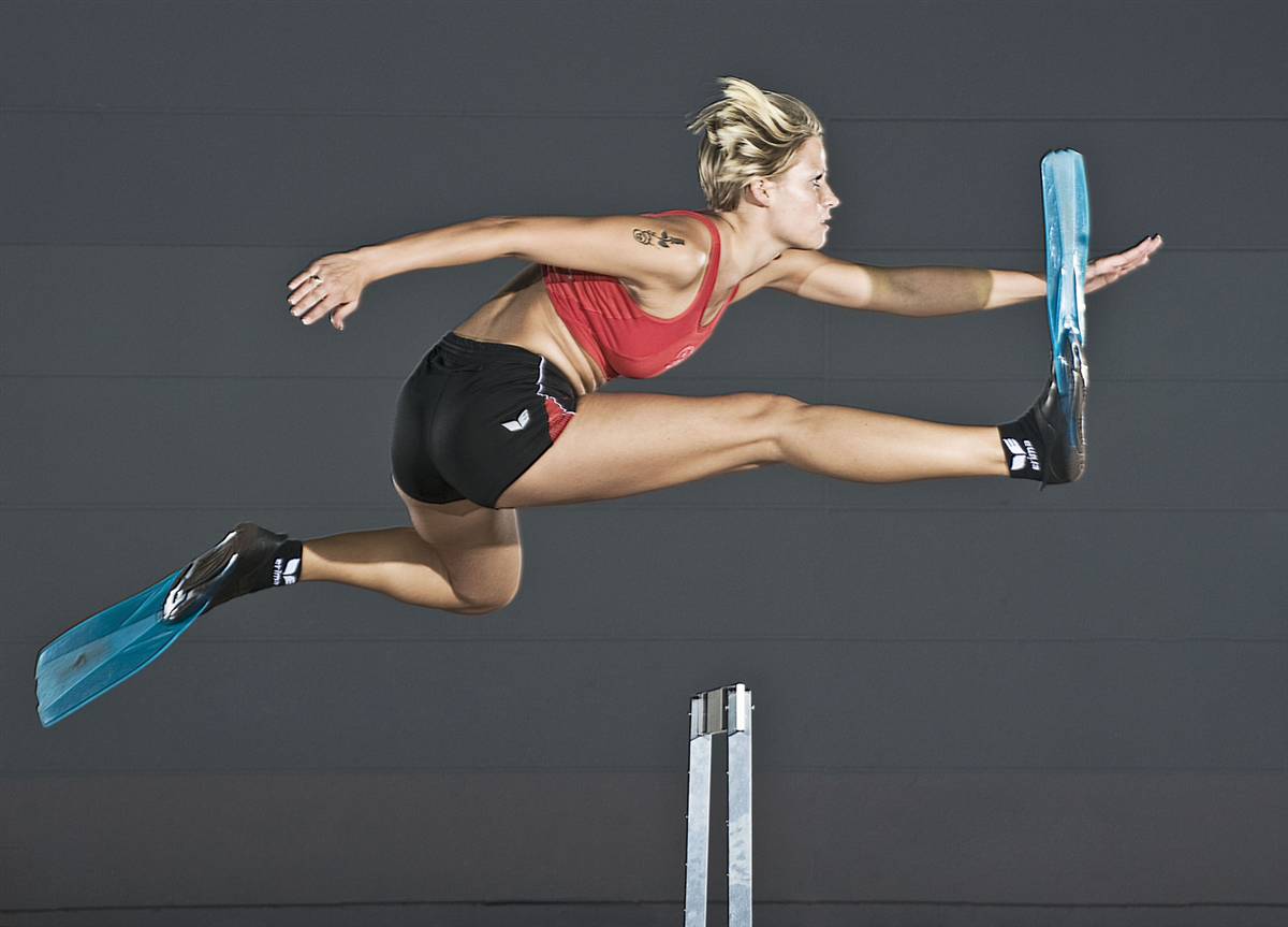 Do you know the Fastest 100-meter hurdles wearing swim fins was by a female